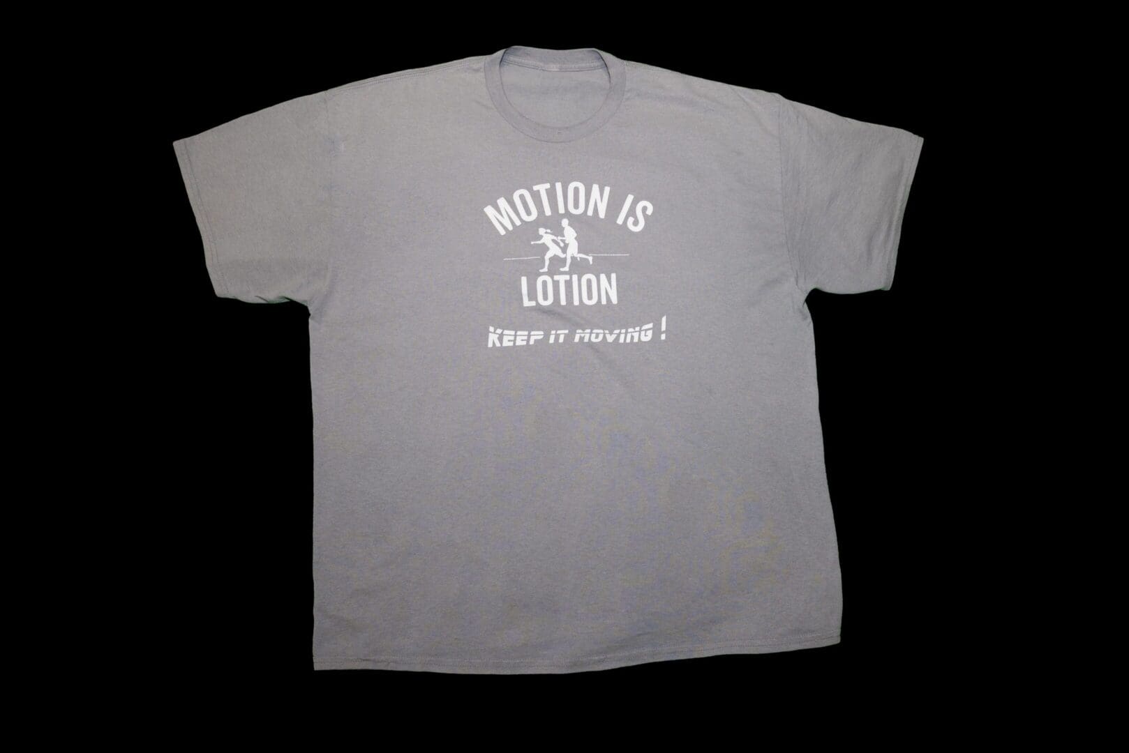 Gray T-shirt: Motion is Lotion.